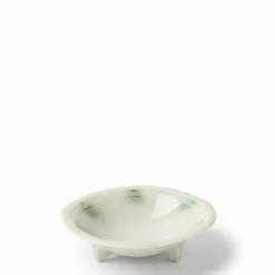 Beautiful green and white glaze on ceramic dishes made in Japan available at Miya.
