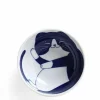 Blue Cats grace these fun tableware pieces made in Japan available at Miya.
