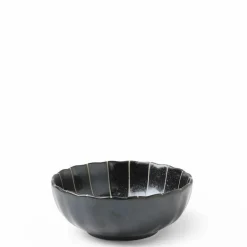 Kasa parasol lines make a simple elegant design for this ceramic bowl made in Japan available at Miya.