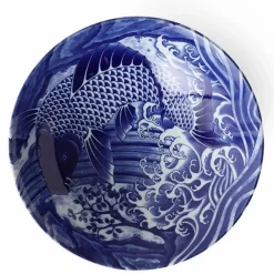 Wild blue koi fish design on a ceramic bowl made in Japan available at Miya.